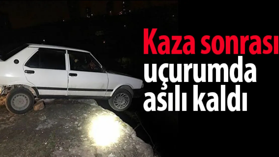 Kaza sonrası uçurumda asılı kaldı