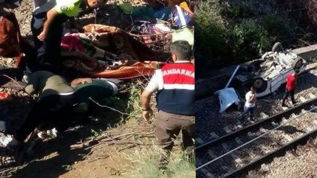 Otomobil köprüden tren yoluna düştü