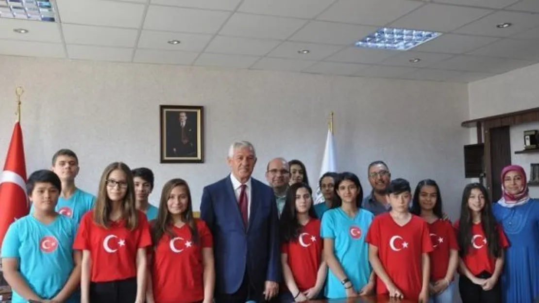 'Bizim Türkümüz' heyeti Müdür Elmalı'yı ziyaret etti