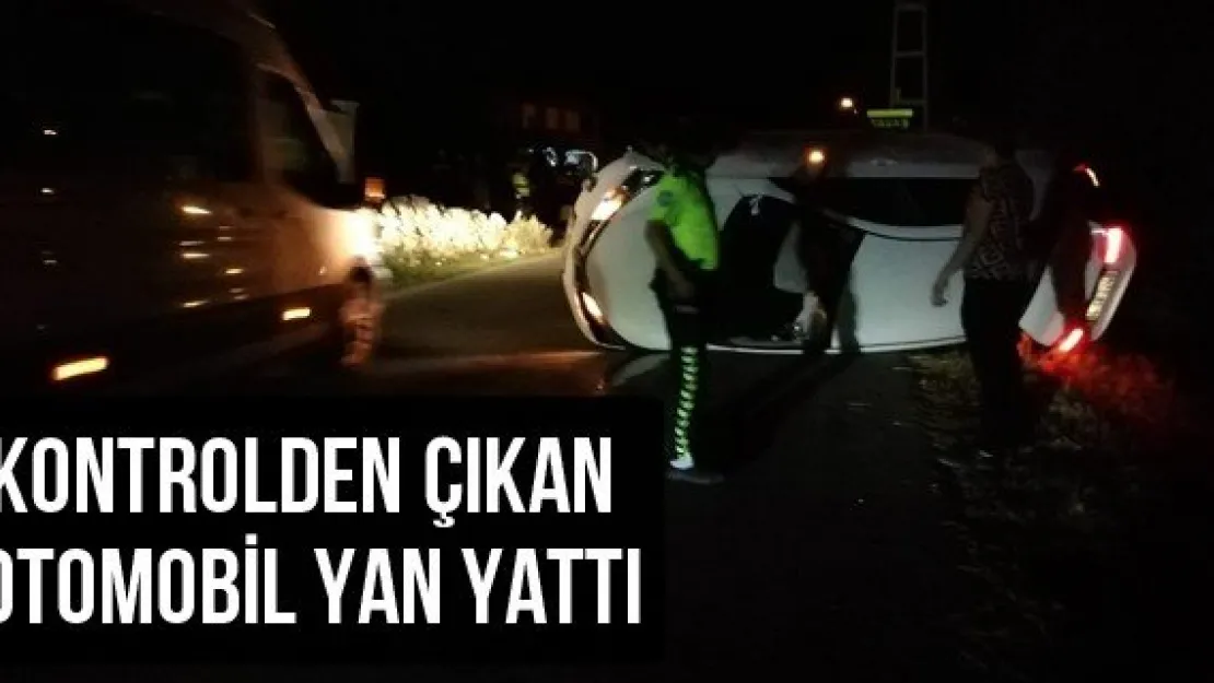 Kontrolden çıkan otomobil yan yattı