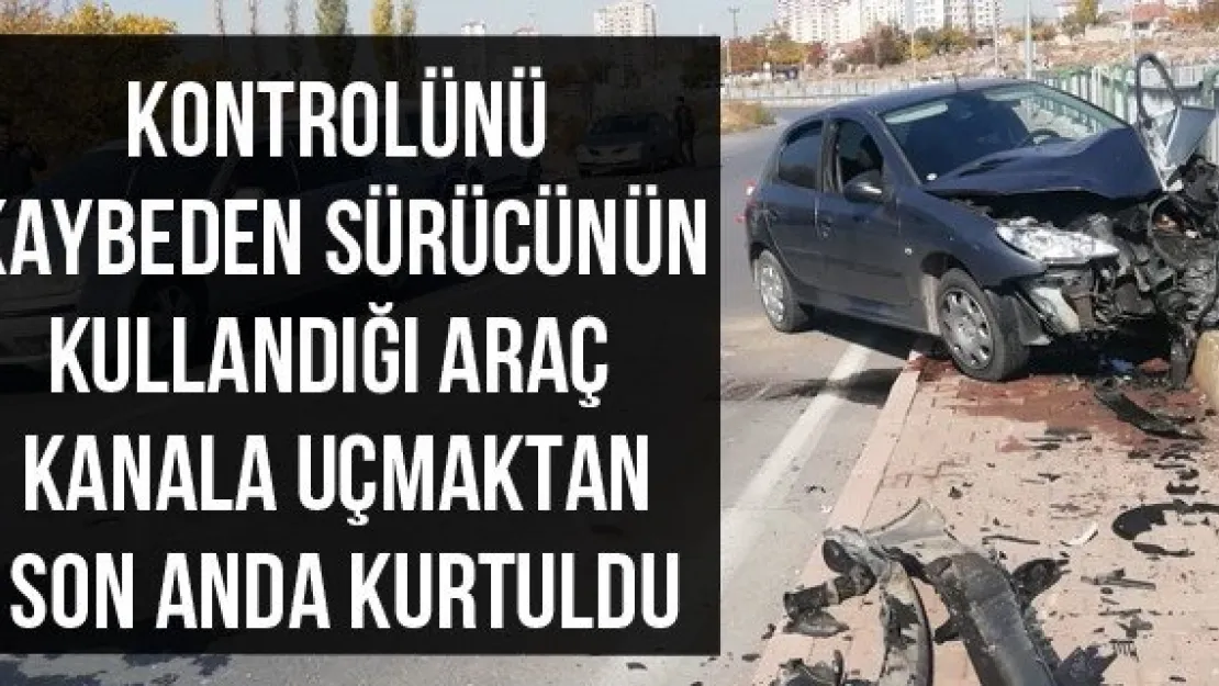 Kontrolünü kaybeden sürücünün kullandığı araç kanala uçmaktan son anda kurtuldu