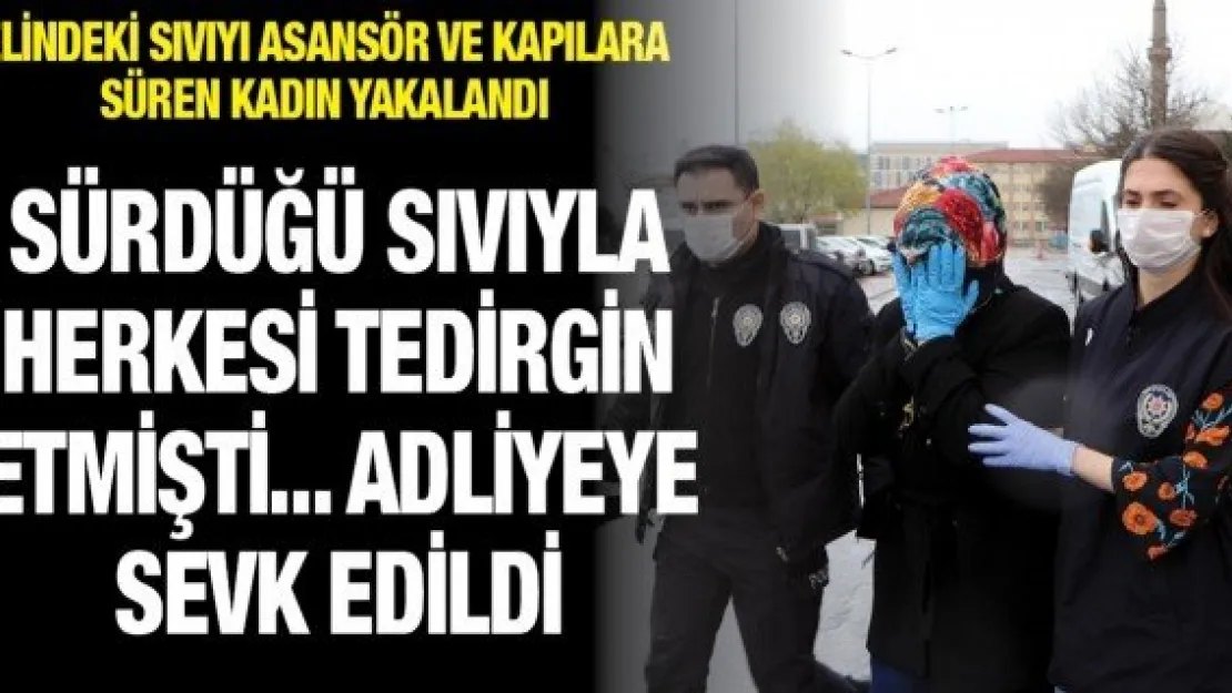 Elindeki sıvıyı asansör ve kapılara süren kadın adliyeye sevk edildi