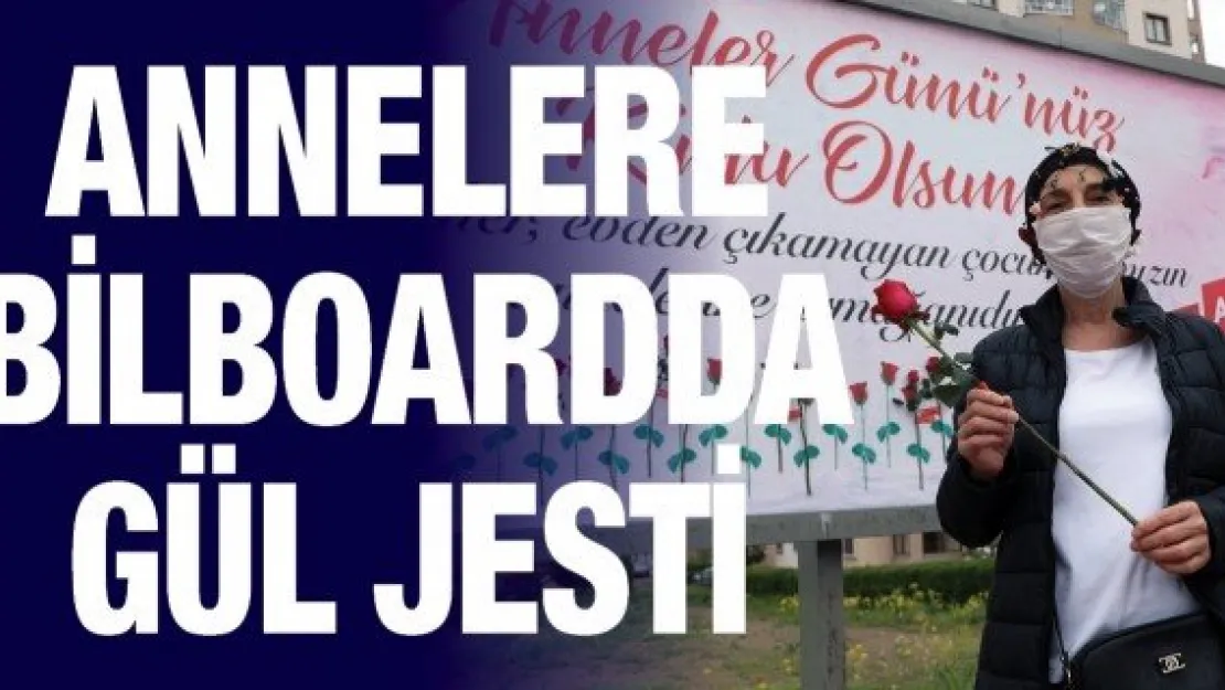 Annelere bilboardda gül jesti