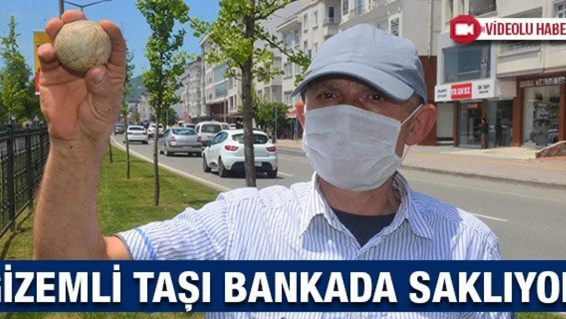 Gizemli taşı bankada saklıyor