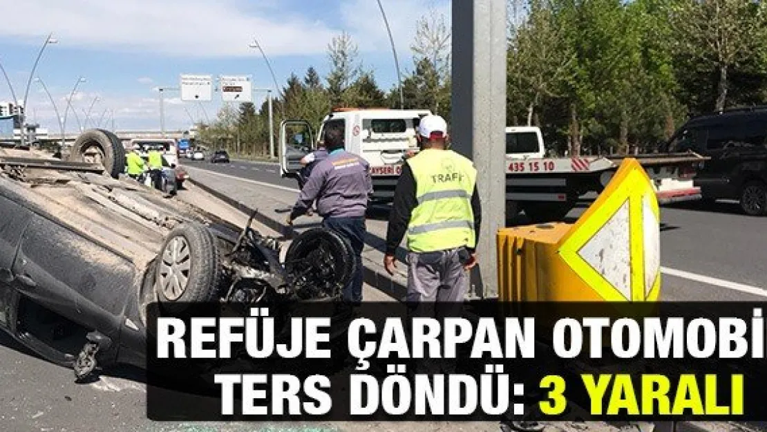 Refüje çarpan otomobil ters döndü: 3 yaralı