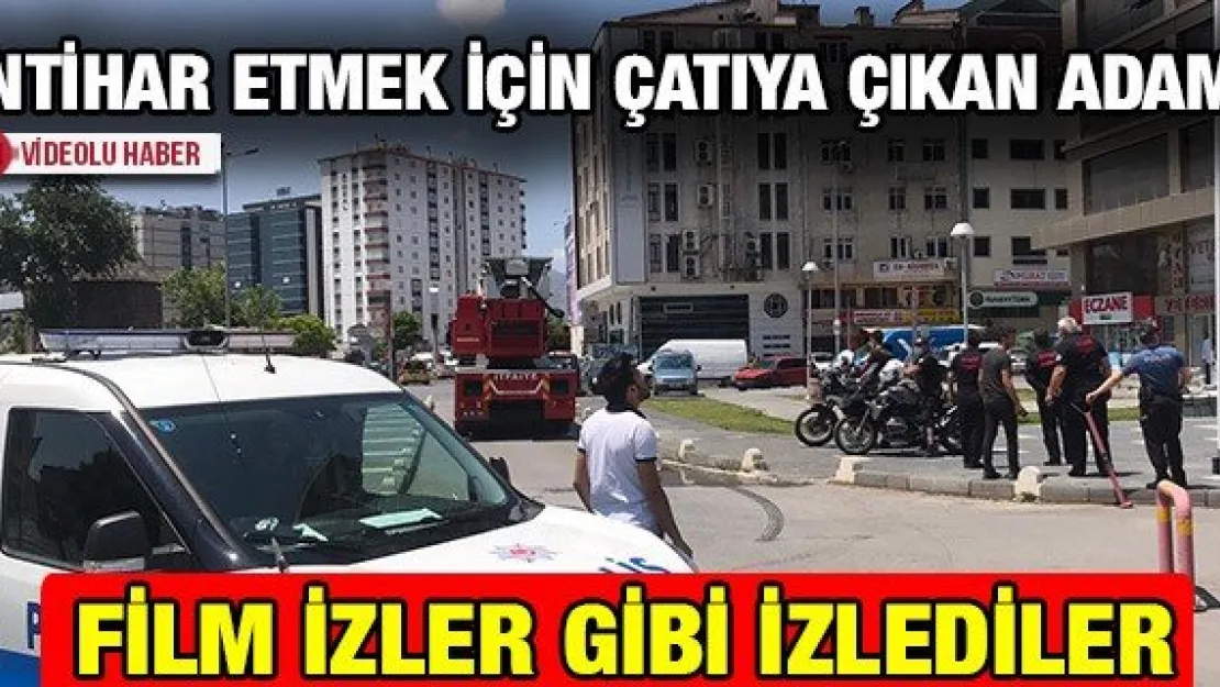 İntihar etmek için çatıya çıkan adamı, film izler gibi izlediler