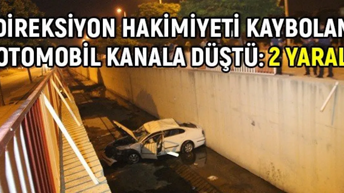 Direksiyon hakimiyeti kaybolan otomobil kanala düştü: 2 yaralı