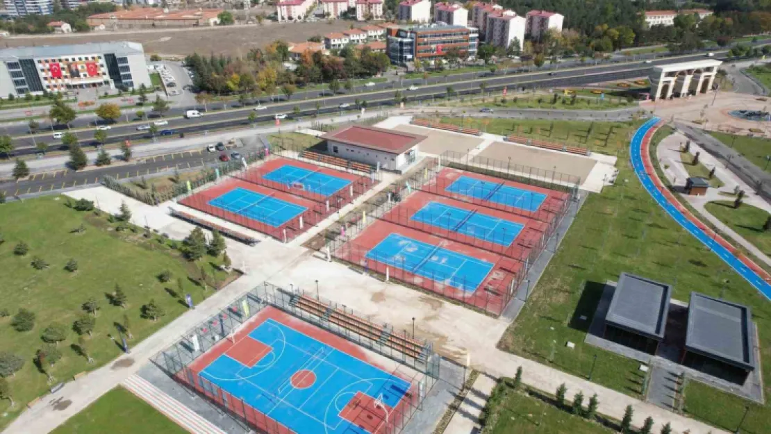 Millet bahçesine tenis kortu ve plaj voleybolu tesisi