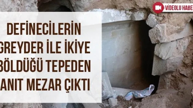 Definecilerin greyder ile ikiye böldüğü tepeden anıt mezar çıktı