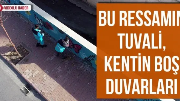 Bu ressamın tuvali, kentin boş duvarları