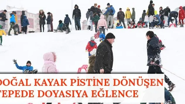 Doğal kayak pistine dönüşen tepede doyasıya eğlence