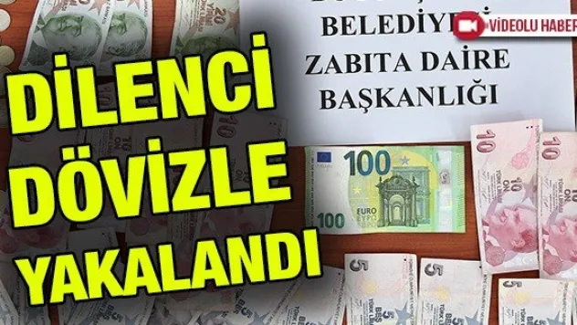 Dilenci dövizle yakalandı