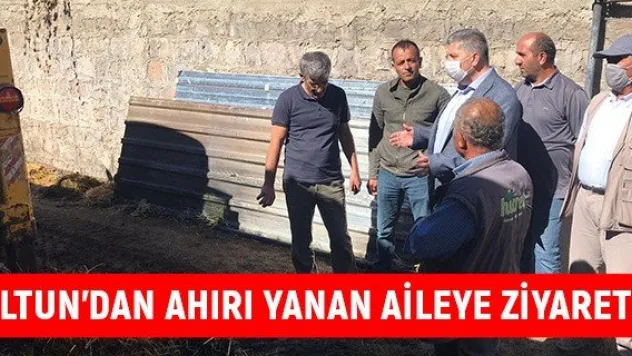 Altun'dan ahırı yanan aileye ziyaret