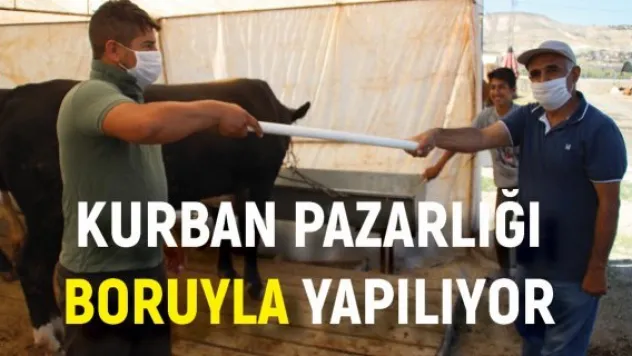 Kurban pazarlığı boruyla yapılıyor