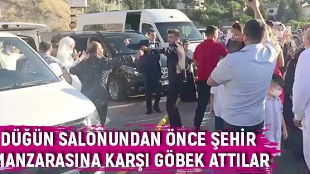Düğün salonundan önce şehir manzarasına karşı göbek attılar