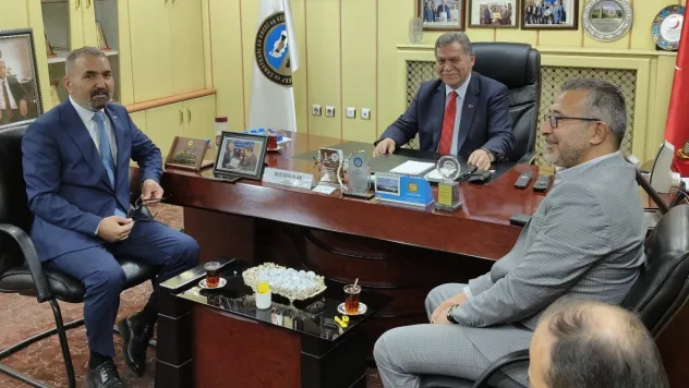 Refik Karakuzay'dan Başkan Alan'a Ziyaret