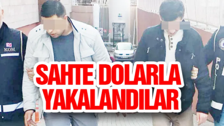 Sahte dolarla yakalandılar