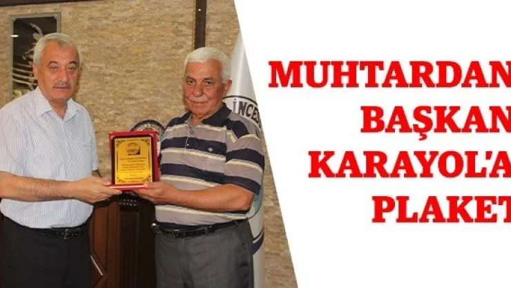 Muhtardan Başkan Karayol'a Plaket