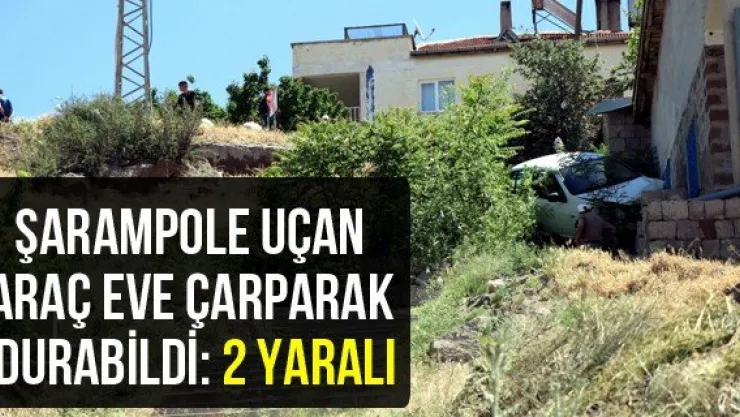 Şarampole uçan araç eve çarparak durabildi: 2 yaralı