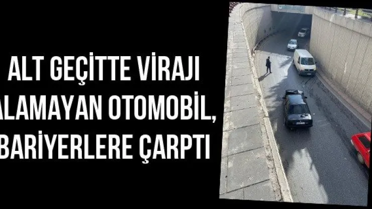 Alt geçitte virajı alamayan otomobil, bariyerlere çarptı