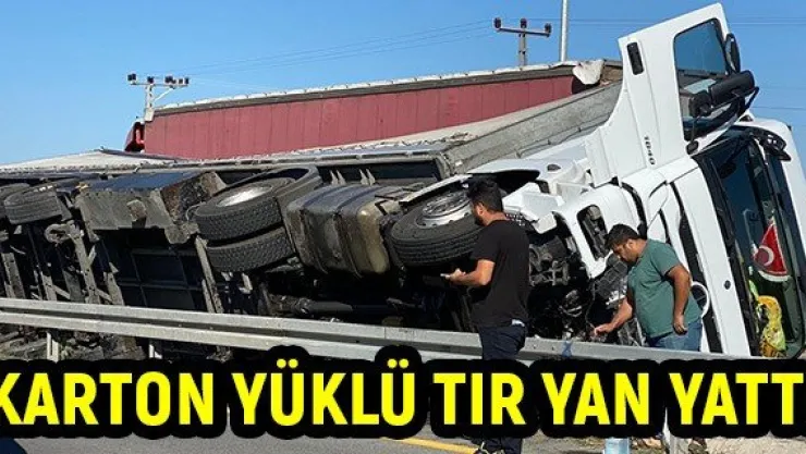 Karton yüklü tır yan yattı