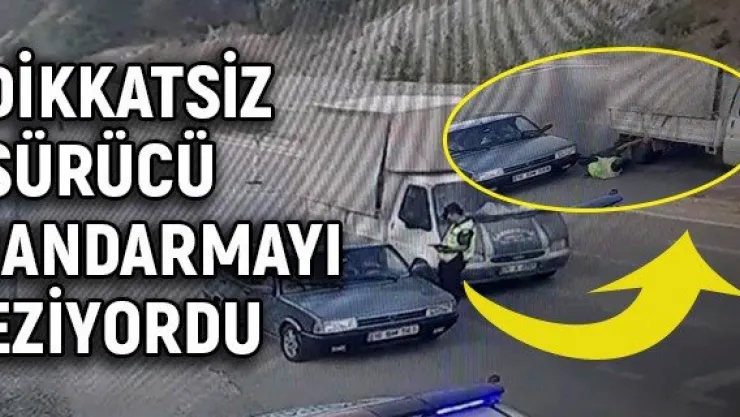 Dikkatsiz sürücü jandarmayı eziyordu